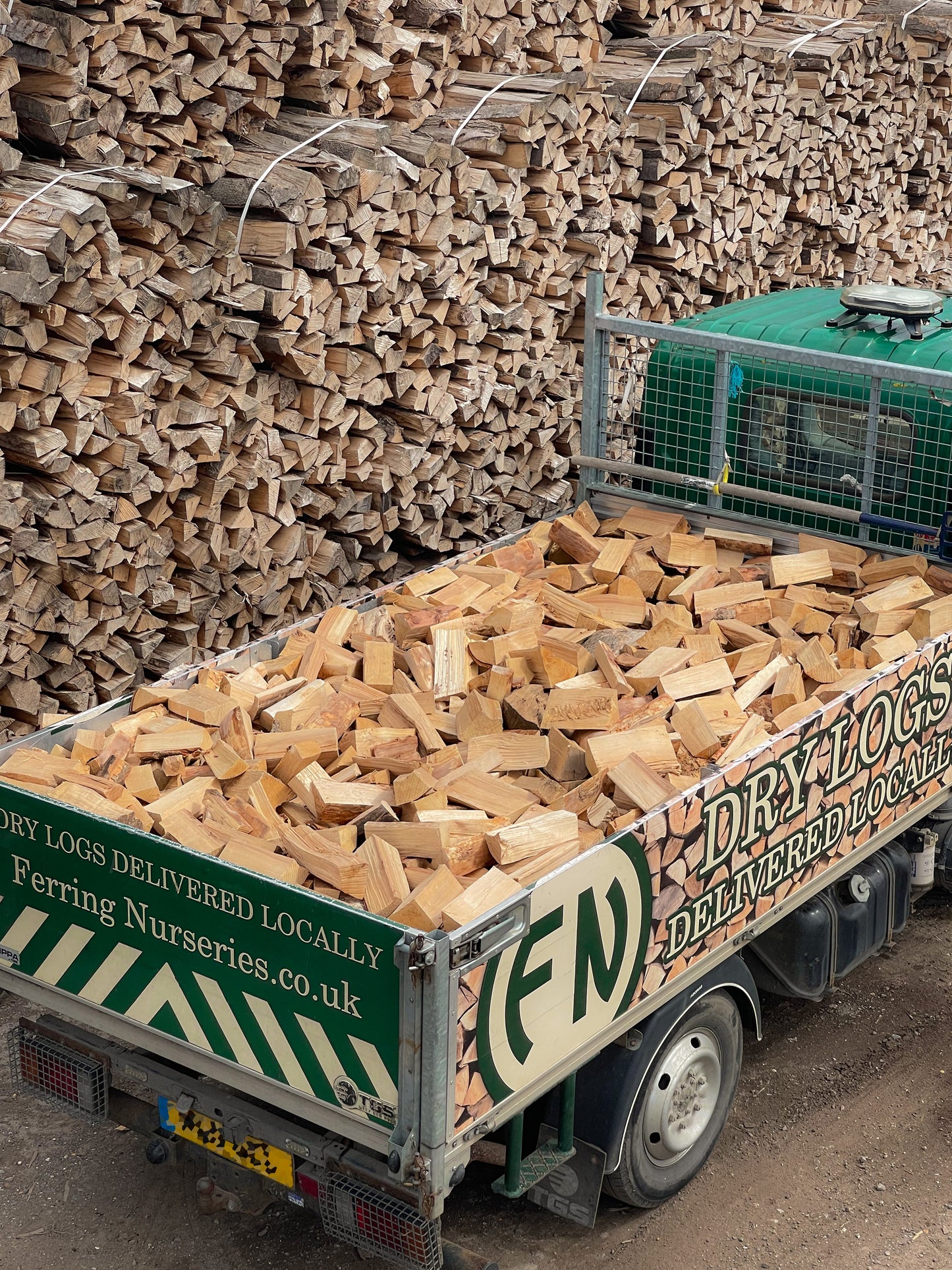 A view of our jumbo load of seasoned firewood loaded into our local delivery van.
