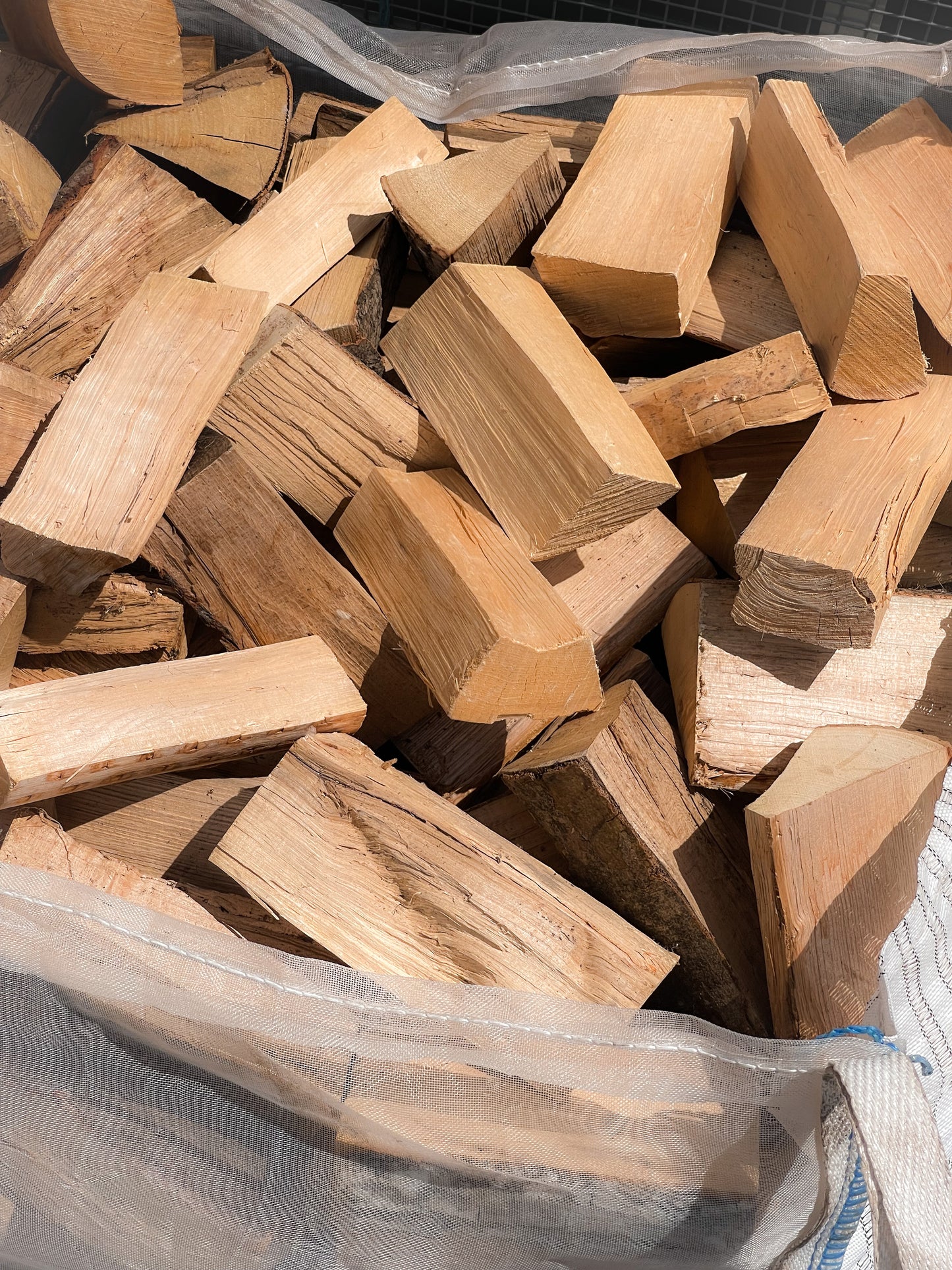 Close up photo of the logs in our Bulk bag of seasoned firewood.