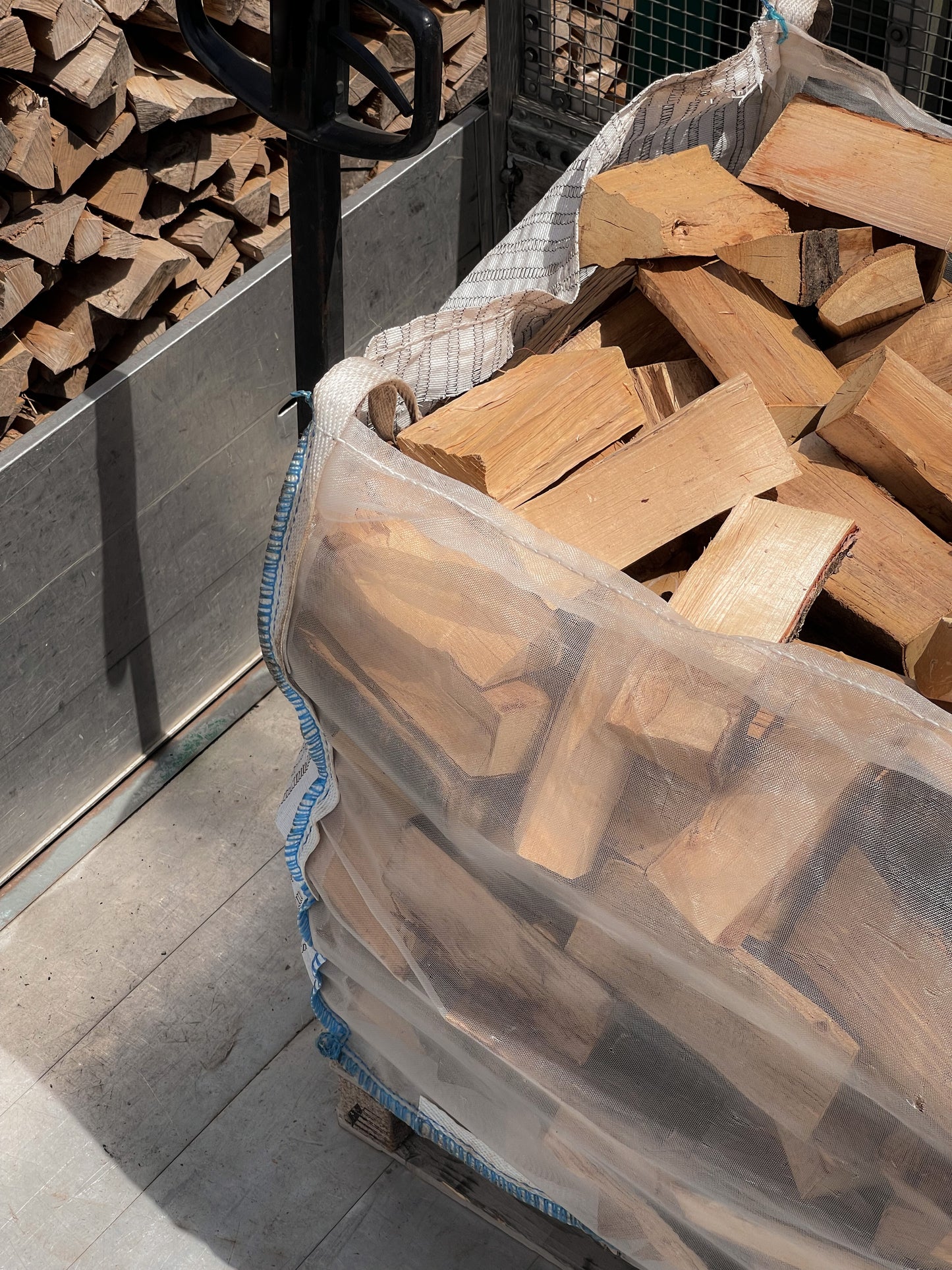 Close up of our Bulk bag of seasoned firewood with pallet truck