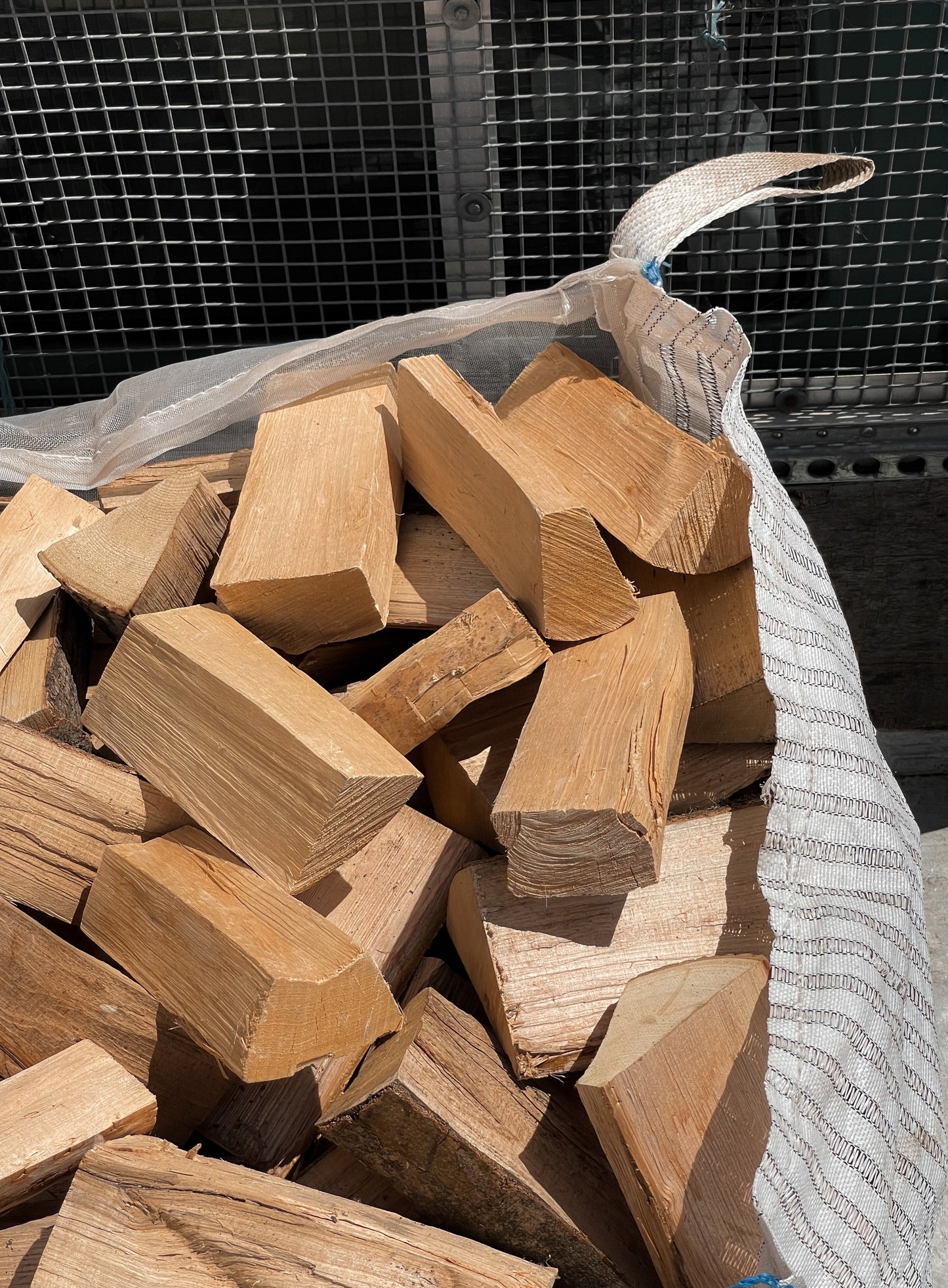Close up of our Bulk bag of seasoned firewood on our local delivery van.