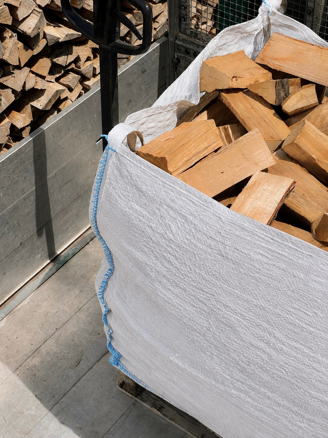 Ferring Firewood bulk bag on the van, showing the reinforced stitching and bulk bag of logs inside.