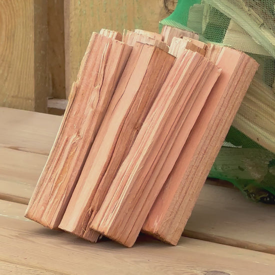 A short video clip of our dry kindling bag stacked against a wooden background.
