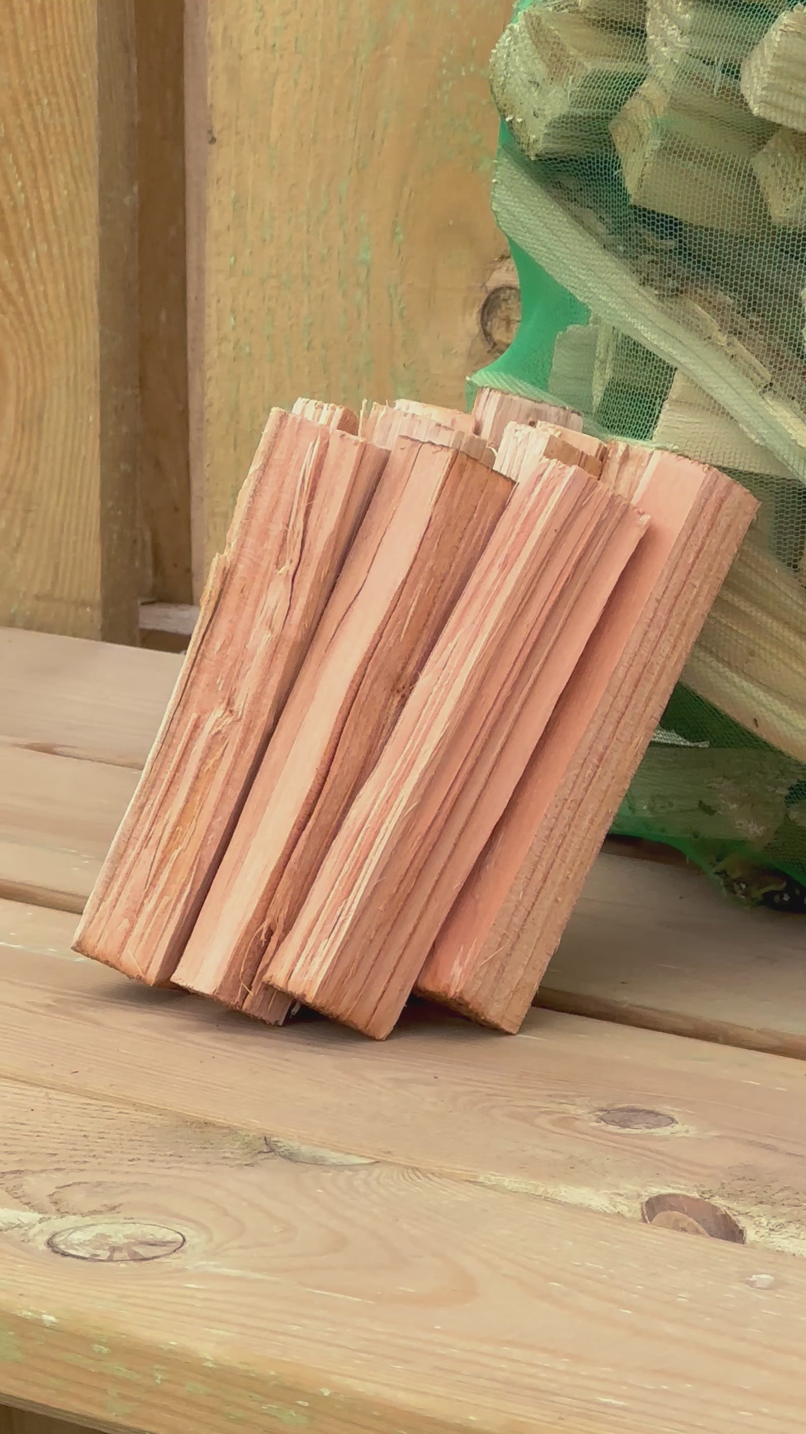A short video clip of our dry kindling bag stacked against a wooden background.