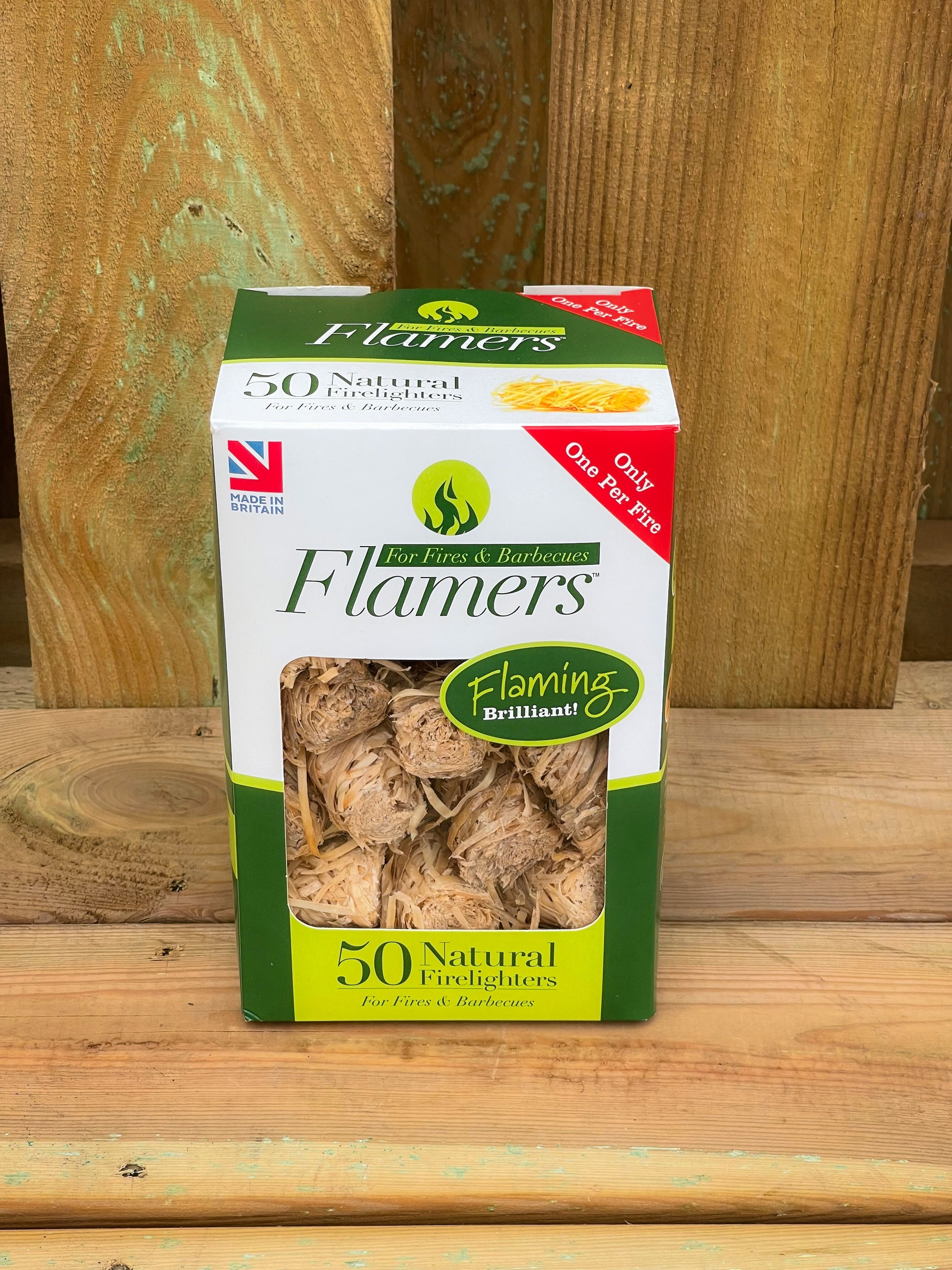 Single box of Flamer Firelighters displayed on a wooden countertop